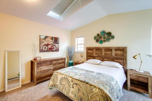 a bedroom with a large bed and a window at Buena Vista Shambala Sanctuary Near Main St! in Buena Vista