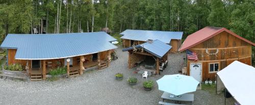 an overhead view of a house with a blue roof at talkeetna villas and tours in Talkeetna