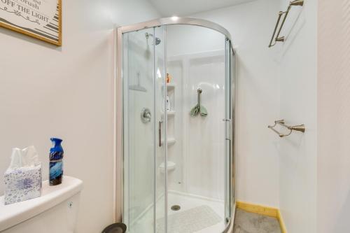 a shower with a glass door in a bathroom at Cozy New York Abode - Porch, Near Fishing and Hiking 