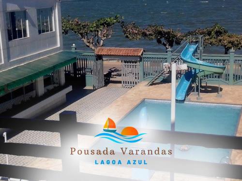a pool with a slide and a water slide at Varandas Lagoa Azul in Araruama