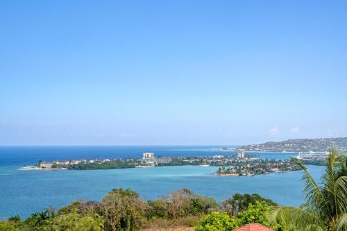 a view of a large body of water at Palm Leaf Cottage in Montego Bay
