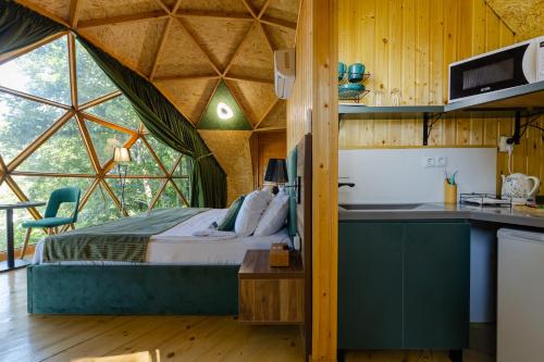 Kuchyň nebo kuchyňský kout v ubytování Glamping Martini Kvariati