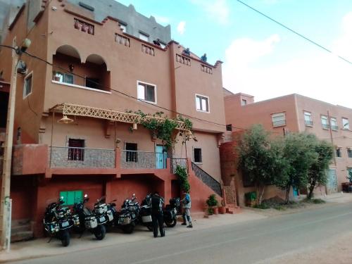 a group of motorcycles parked in front of a building at Auberge NICE VIEW DADES in Akhendachou nʼAït Ouffi