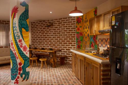 Kuchyň nebo kuchyňský kout v ubytování Casa Arev
