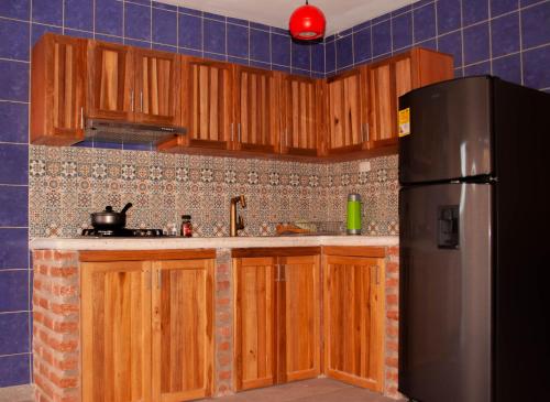 Kuchyň nebo kuchyňský kout v ubytování Casa Arev