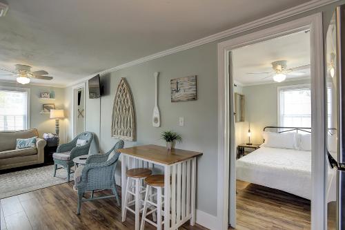 a bedroom with a bed and a table and chairs at Pura Vida - B -Murrells Inlet in Myrtle Beach