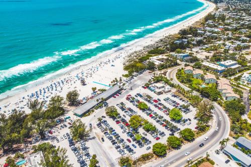 an aerial view of the beach and the ocean at Longboard in Holmes Beach