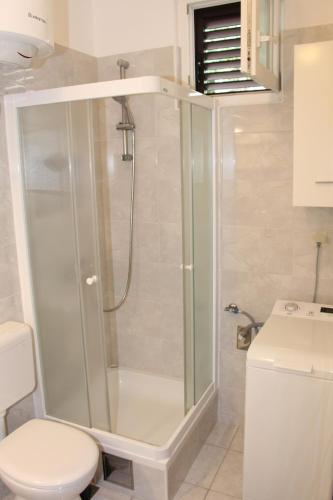 Apartments by the sea Podgora, Makarska - 21378