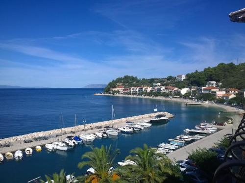 Apartments by the sea Podgora, Makarska - 21378