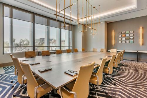 a large conference room with a large table and chairs at Omni Tempe Hotel at ASU in Tempe
