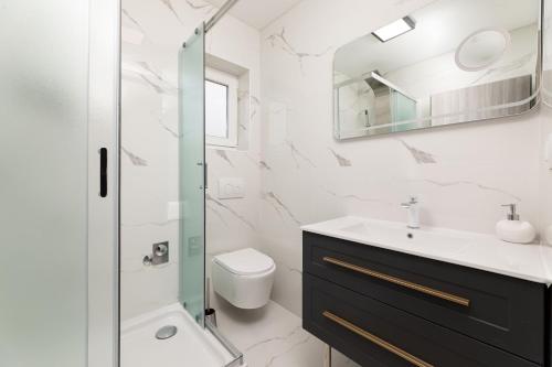 Bilik mandi di Apartments Vugrin