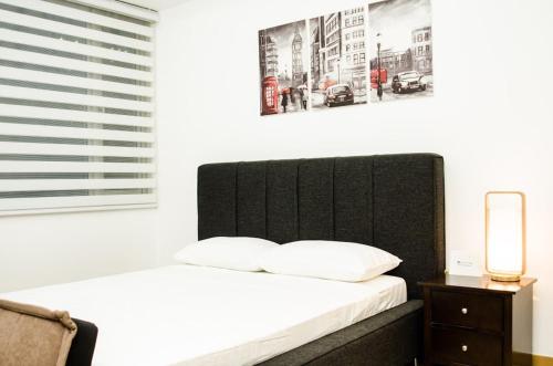 Katil atau katil-katil dalam bilik di Prime Avant BGC Location Apartments by PH Staycation