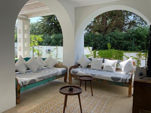 En eller flere senge i et værelse på Villa Paolo - Rosa Marina Ostuni