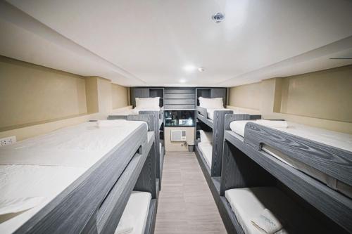 Postel nebo postele na pokoji v ubytování Seeya Hotel