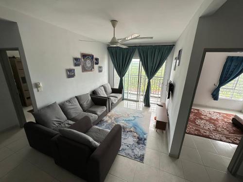 Posezení v ubytování Homestay Ar Rayyan RESIDENSI LAGUNA BIRU