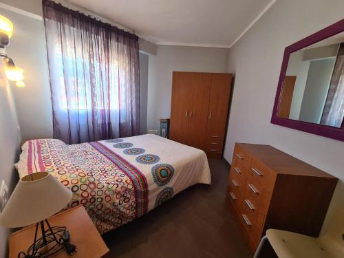 Posteľ alebo postele v izbe v ubytovaní Atico Barcelona IF Benidorm