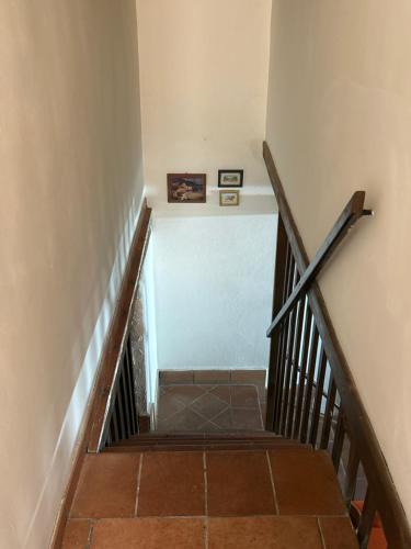 a stairway with a stair case in a building at La Casa Del Borgo Cavallaro in Gaggi