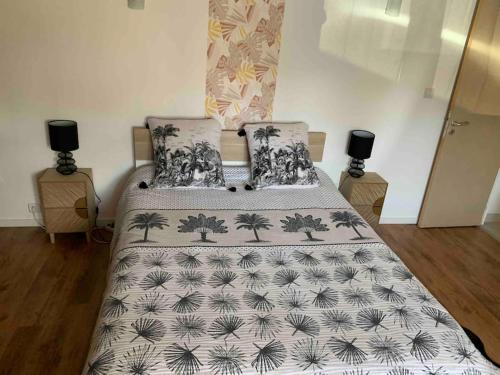 a bedroom with two twin beds withskirts at Logement à 5 minutes du circuit in Ruaudin