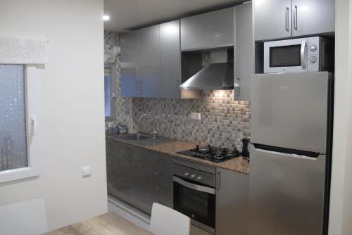 Кухня або міні-кухня у Apartamento en Ani