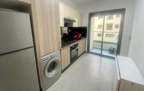 Una cocina o zona de cocina en Appartement les pieds dans l'eau WELCOME STAY