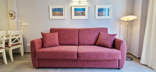 Гостиная зона в Malaga Lodge Apartments