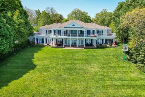 an aerial view of a large house with a yard at Somerset - A Private Retreat in Niagara on the Lake
