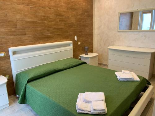 A bed or beds in a room at Appartamento La Casa di Anna
