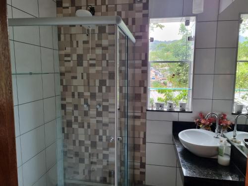Salle de bains dans l'établissement Casa Faisão