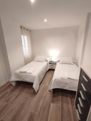 Posteľ alebo postele v izbe v ubytovaní Apartamento Sotillo