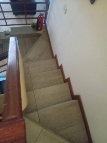 a stairway in a room with a stair case at Spintex Villas - Available for Long Term Rentals in Ablekuma