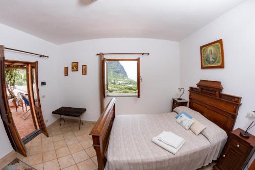 Postel nebo postele na pokoji v ubytování Agriturismo Al Cappero
