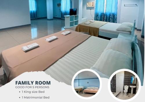 ein Schlafzimmer mit 2 Betten und Handtüchern darauf in der Unterkunft La Elliana Hotel & Restaurant, Inc. in Laoag