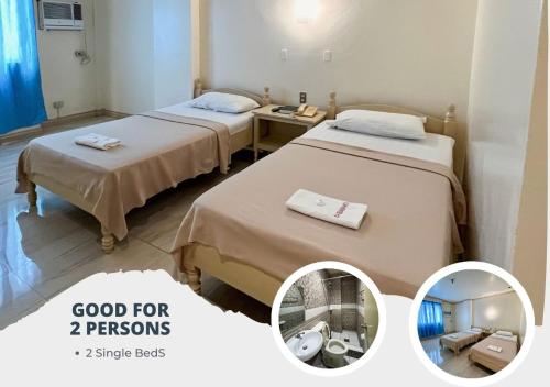 ein Hotelzimmer mit 2 Betten und einem Schild, das gut für Personen ist in der Unterkunft La Elliana Hotel & Restaurant, Inc. in Laoag