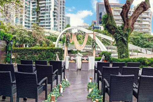 a wedding ceremony set up in a city with chairs at Four Points by Sheraton Singapore, Riverview in Singapore