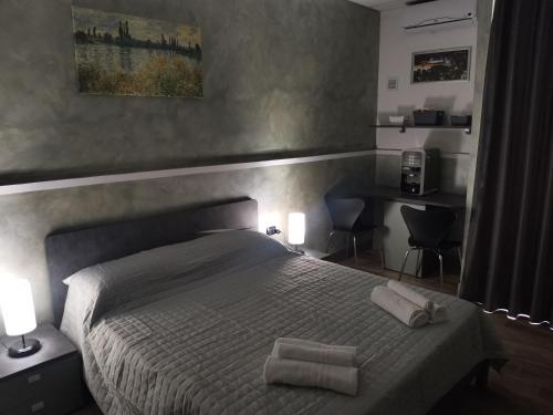 Ένα ή περισσότερα κρεβάτια σε δωμάτιο στο Nunù Bed and Breakfast