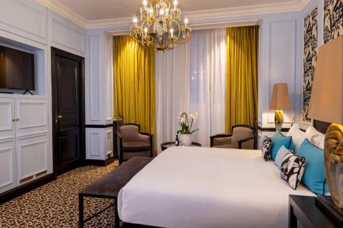Ένα ή περισσότερα κρεβάτια σε δωμάτιο στο Hotel West-End