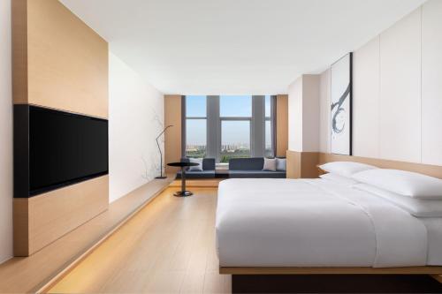 Μια τηλεόραση ή/και κέντρο ψυχαγωγίας στο Fairfield by Marriott Liaocheng Dongchangfu