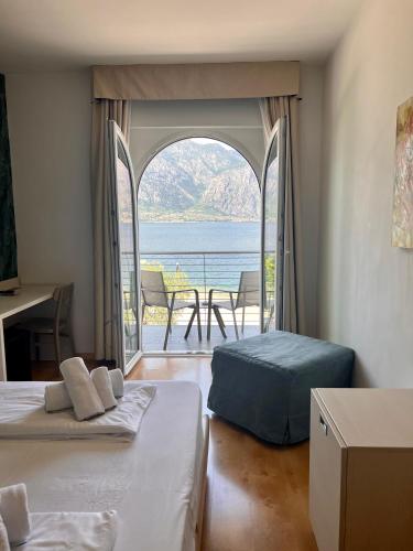 Postel nebo postele na pokoji v ubytování Albergo San Remo
