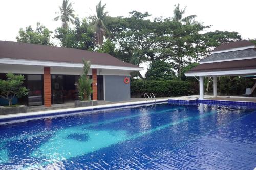 Piscine de l'établissement Only Seed Resort 欧芮希度假酒店 ou située à proximité