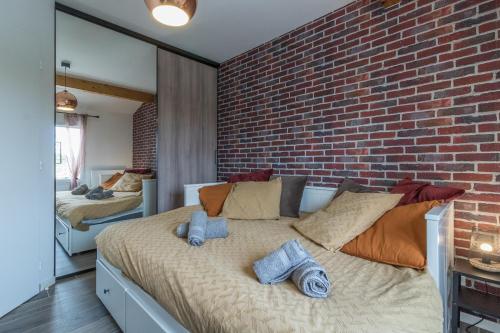Postel nebo postele na pokoji v ubytování Les Villas de Castel - Villa Les Chênes