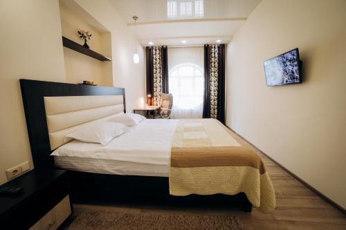 Кровать или кровати в номере Family House