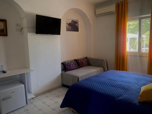 Postel nebo postele na pokoji v ubytování Capri Melody