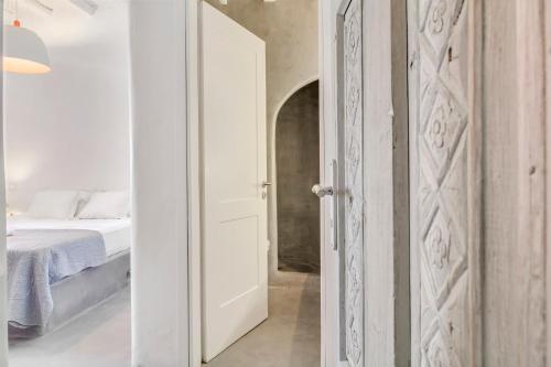 Ένα ή περισσότερα κρεβάτια σε δωμάτιο στο Mermaid Luxury Villas - Aquata Private pool