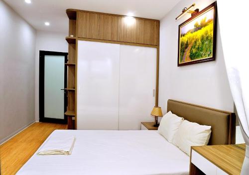 Posteľ alebo postele v izbe v ubytovaní Blue Home Serviced Apartment Hanoi