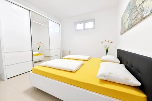 Postel nebo postele na pokoji v ubytování Apartment Mary 3