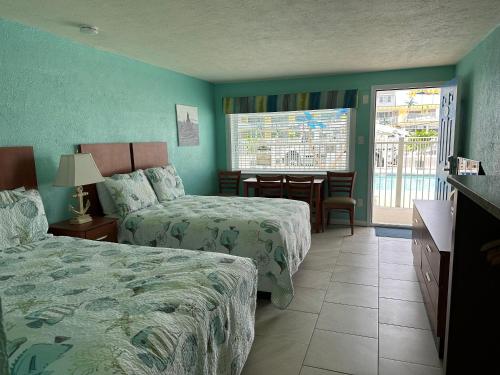Postel nebo postele na pokoji v ubytování Ala Kai Resort Motel