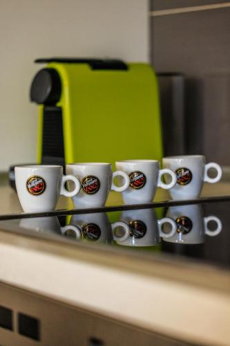 Kemudahan buat kopi dan teh di Orchidea Apartman