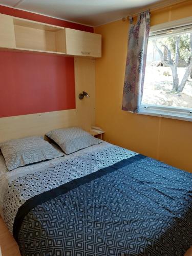 מיטה או מיטות בחדר ב-LAVATOGGIO