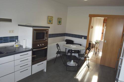 Dapur atau dapur kecil di Casa con jardín en Rascafría