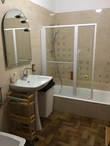 a bathroom with a sink and a shower at La Gaillarde in Céreste
